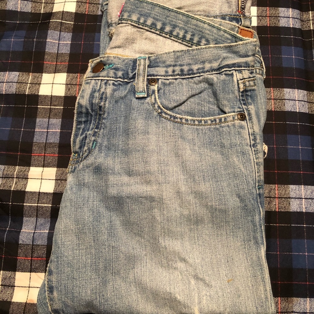 Abercrombie and Fitch destroyed jeans.
